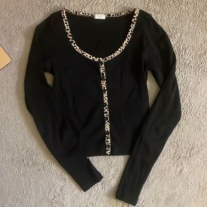 John Galt black long sleeve with cheetah design